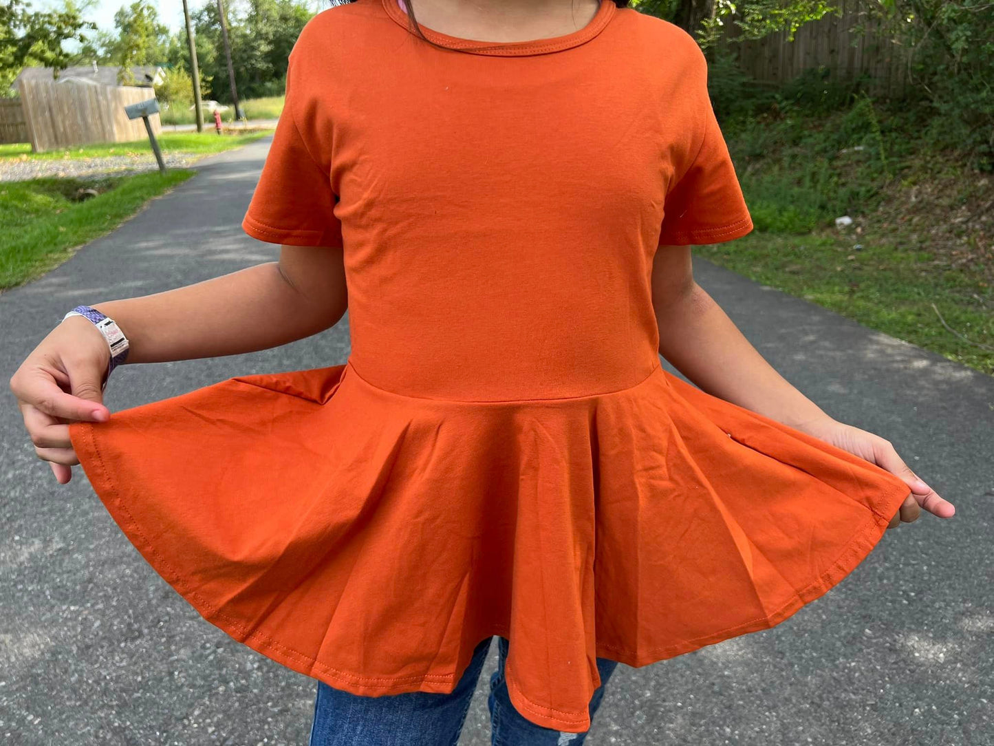 burnt orange twirl top