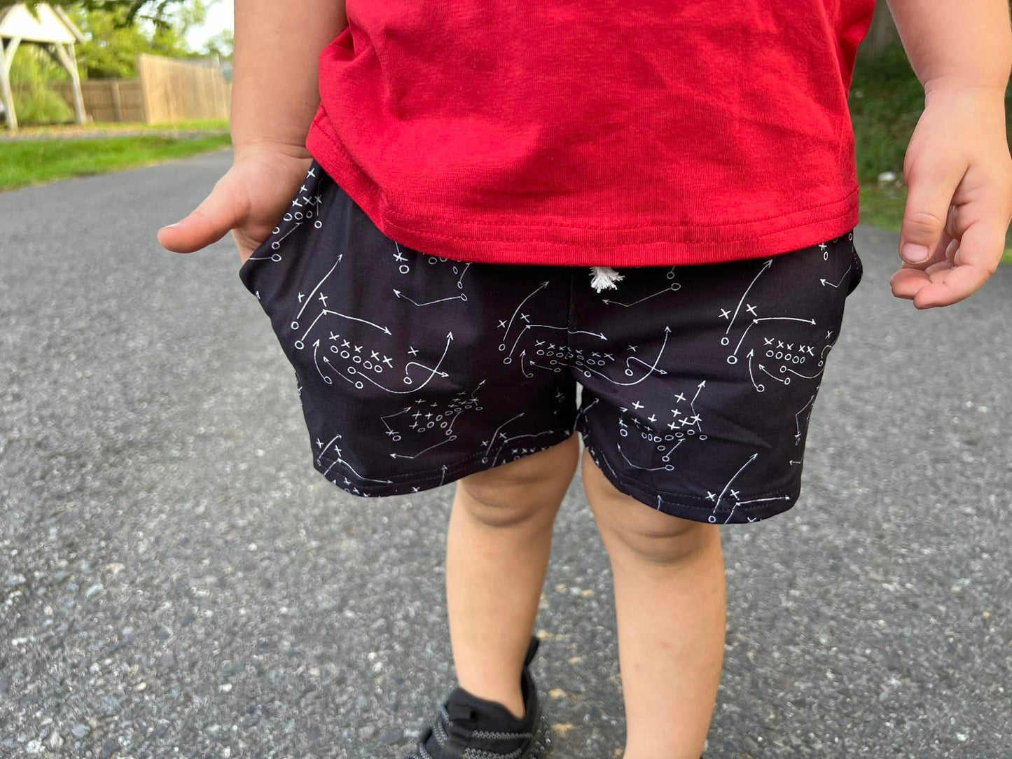 black football plays Steele shorts