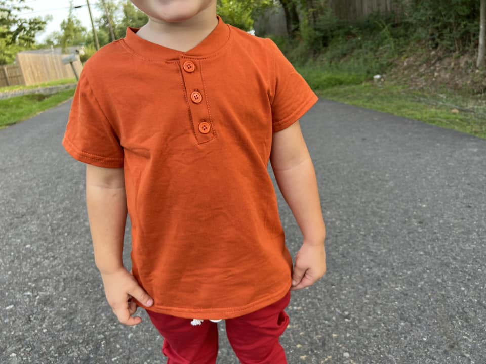 burnt orange half button shirt