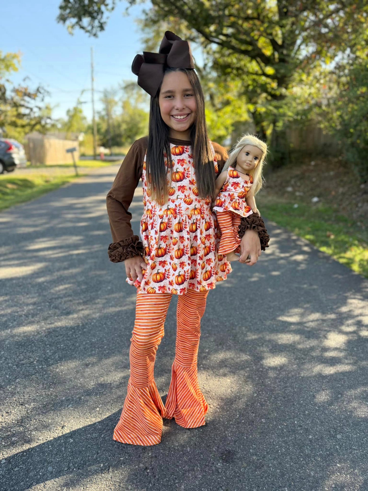 DOLL fall pumpkin cross back top and orange/cream stripe extra wide bells