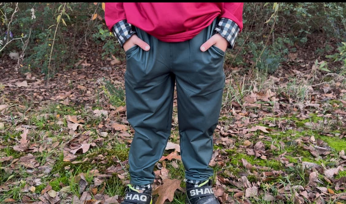 printed green joggers with plaid cuffs