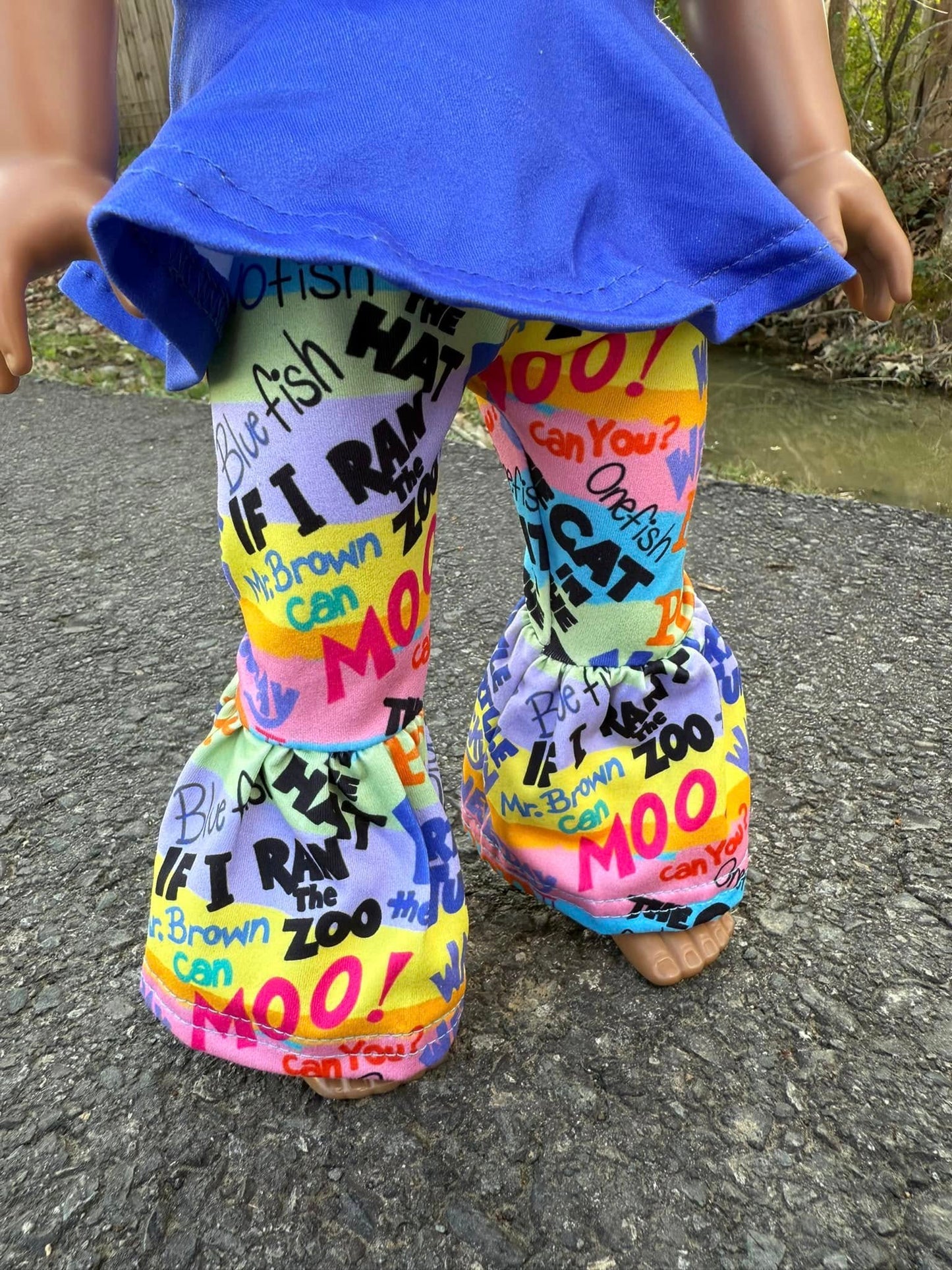 DOLL Royal purple twirl top and Seuss books bells set