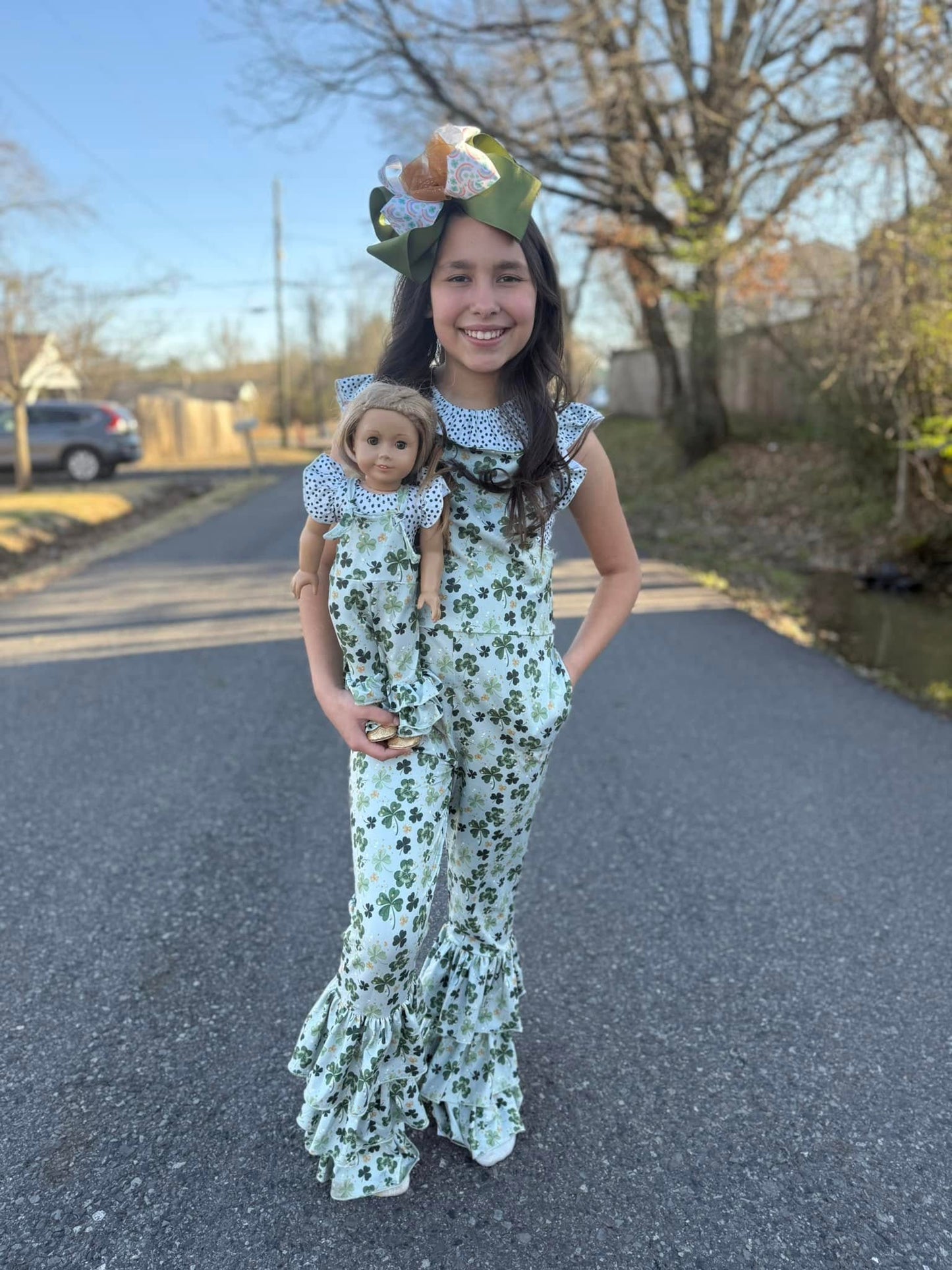 DOLL cream polka dot Leo and shamrock triple bell romper set