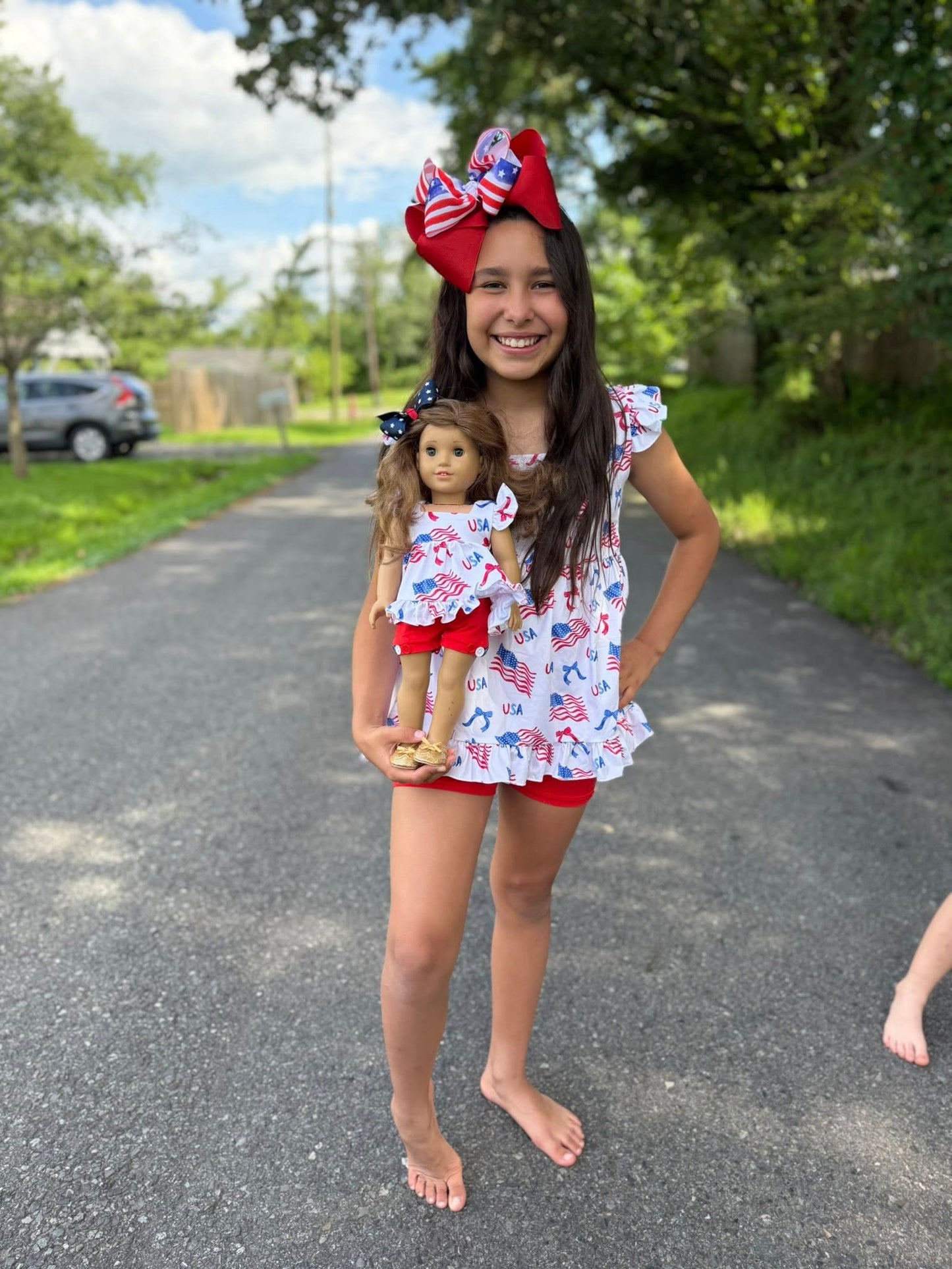 DOLL cream USA Lexi top and red button shorts with blue buttons set