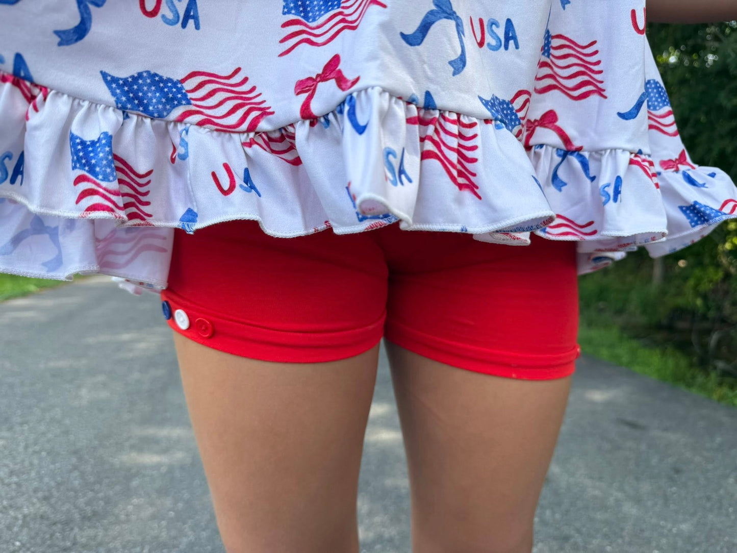 red button shorts with red, white and blue buttons
