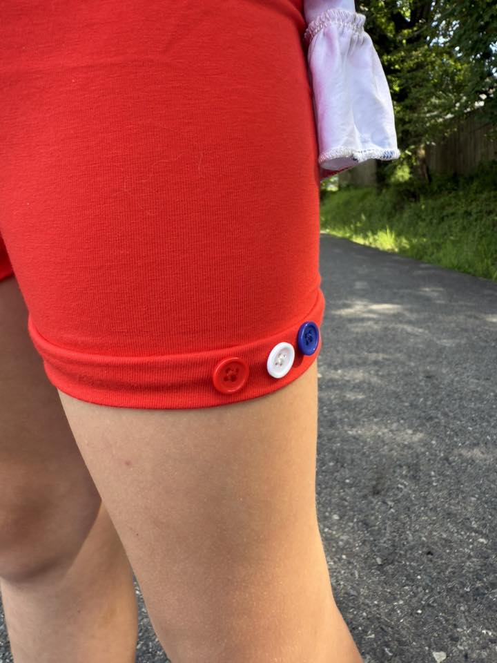 red button shorts with red, white and blue buttons