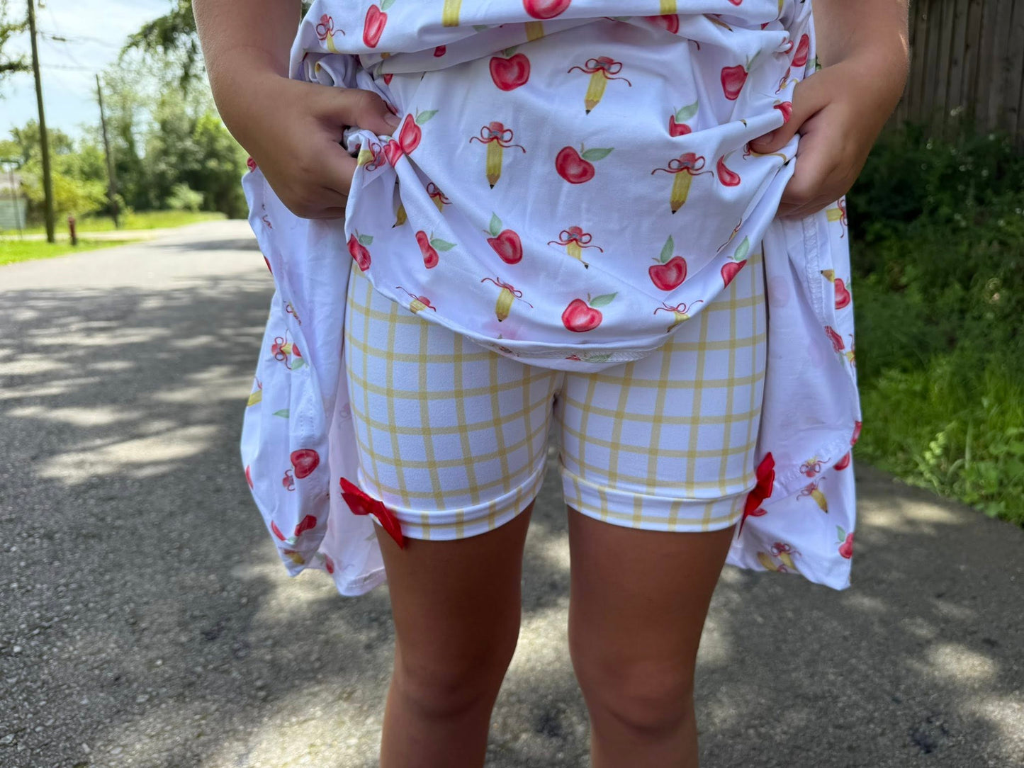 yellow and white checkered shorts with bows