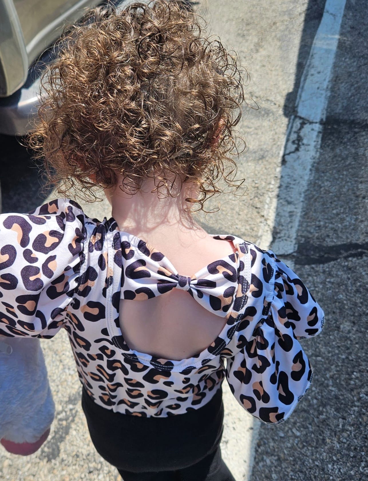 leopard bow back leo (all leo’s have buttons)