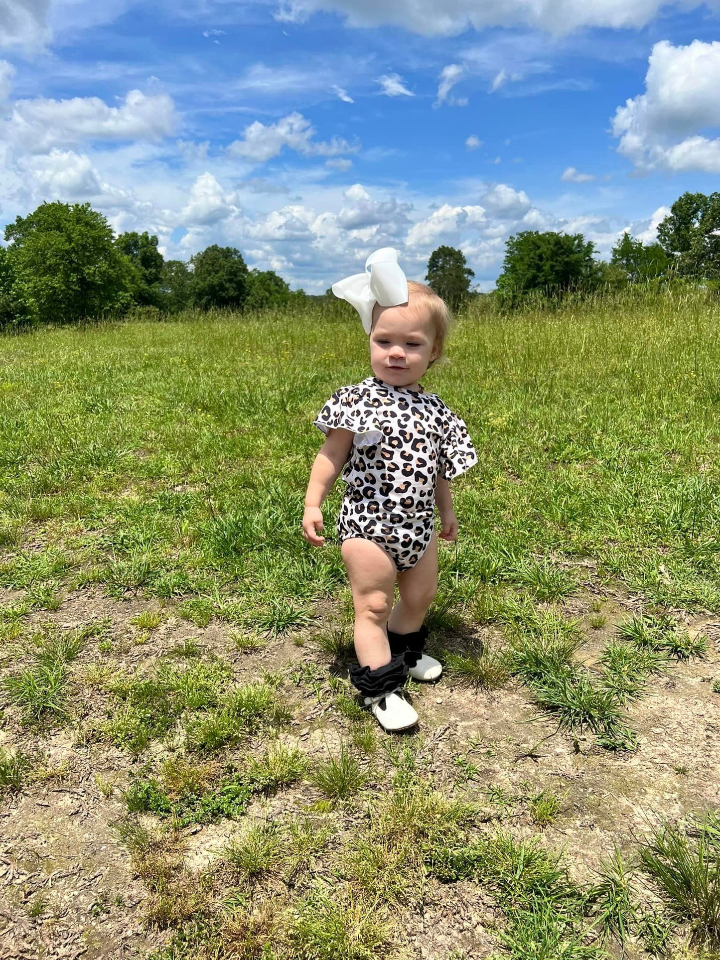 leopard bow back leo (all leo’s have buttons)