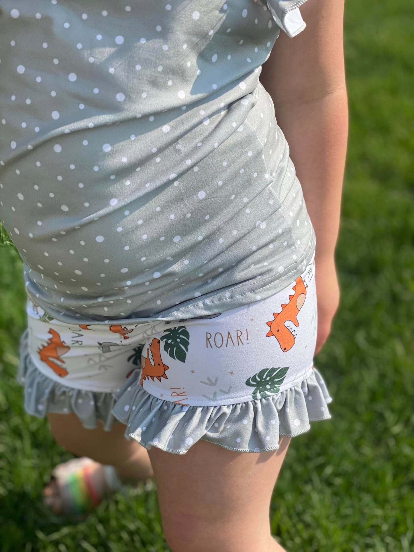 dino roar with grey polka dot ruffle shorties