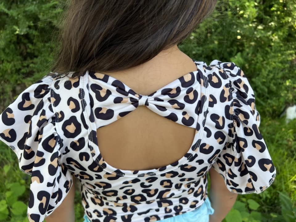 leopard bow back leo (all leo’s have buttons)