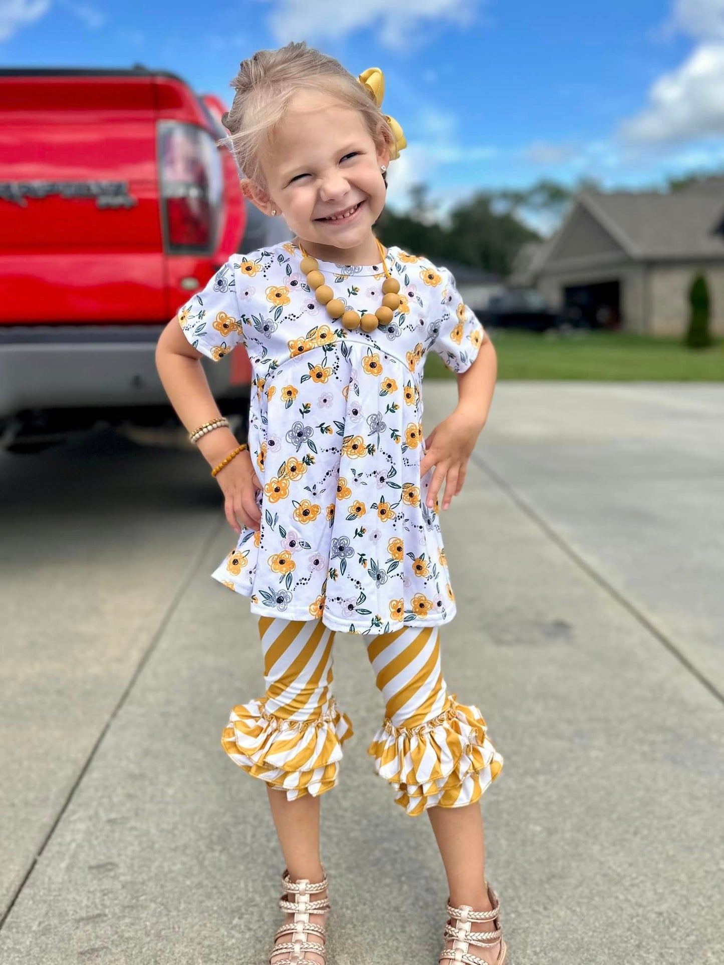 diagonal mustard and white stripe triple bell capris