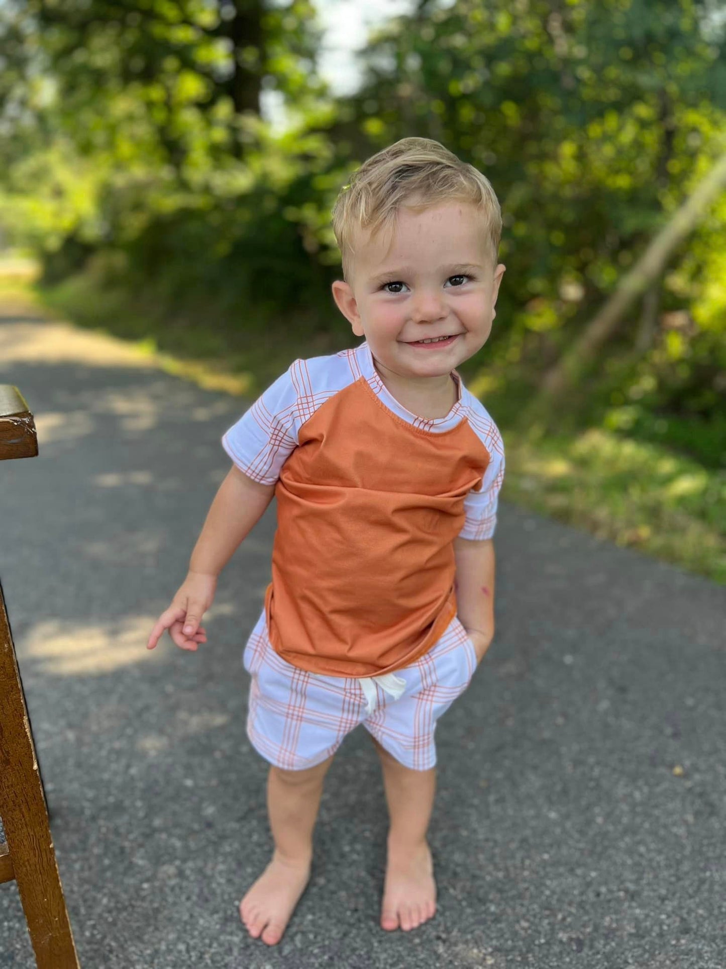 burnt orange raglan with plaid stripe sleeves