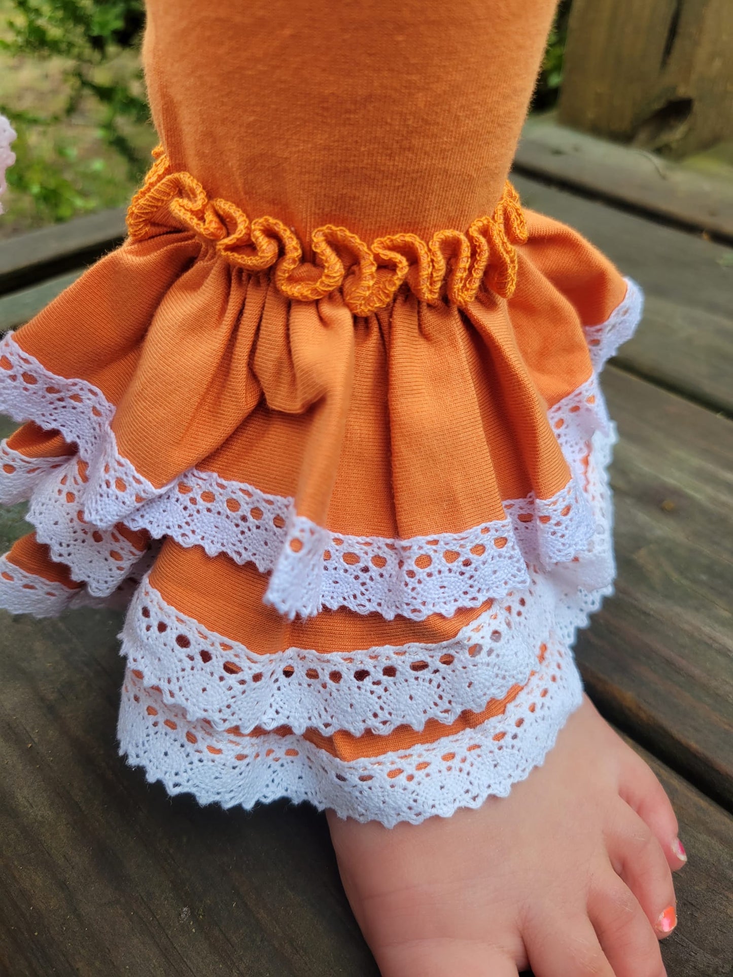 pumpkin orange triple bells with lace