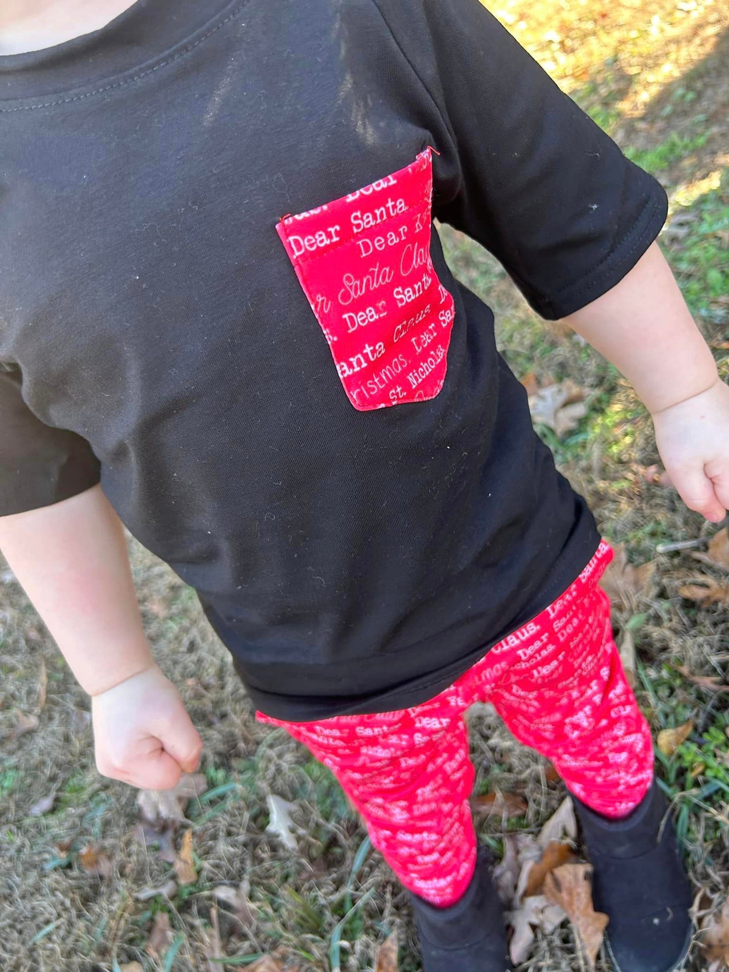 black christmas words pocket tee