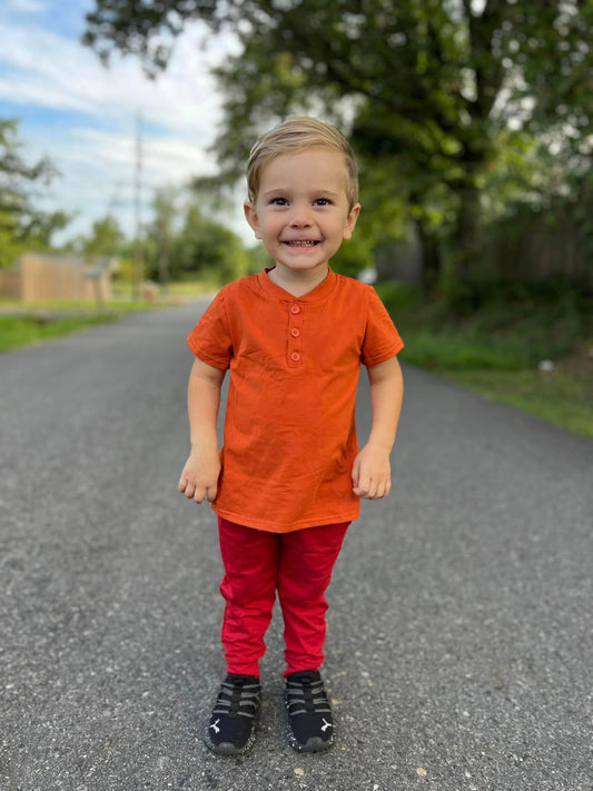 burnt orange half button shirt