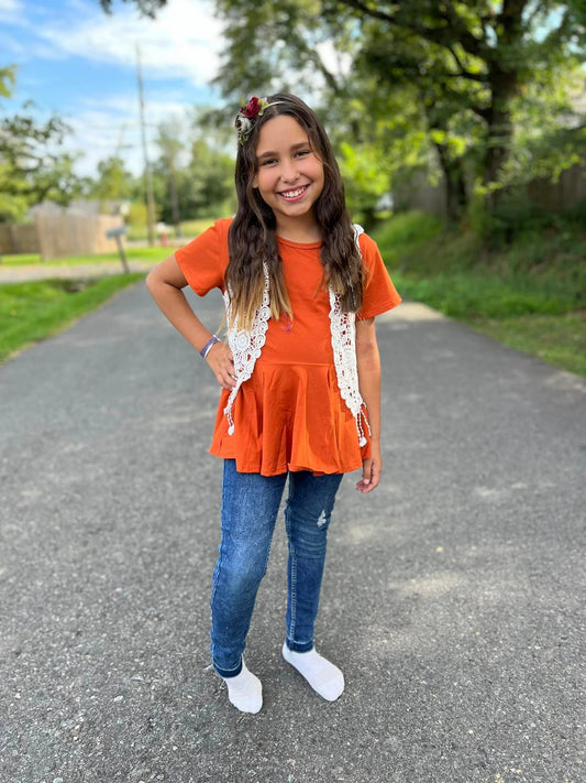 burnt orange twirl top