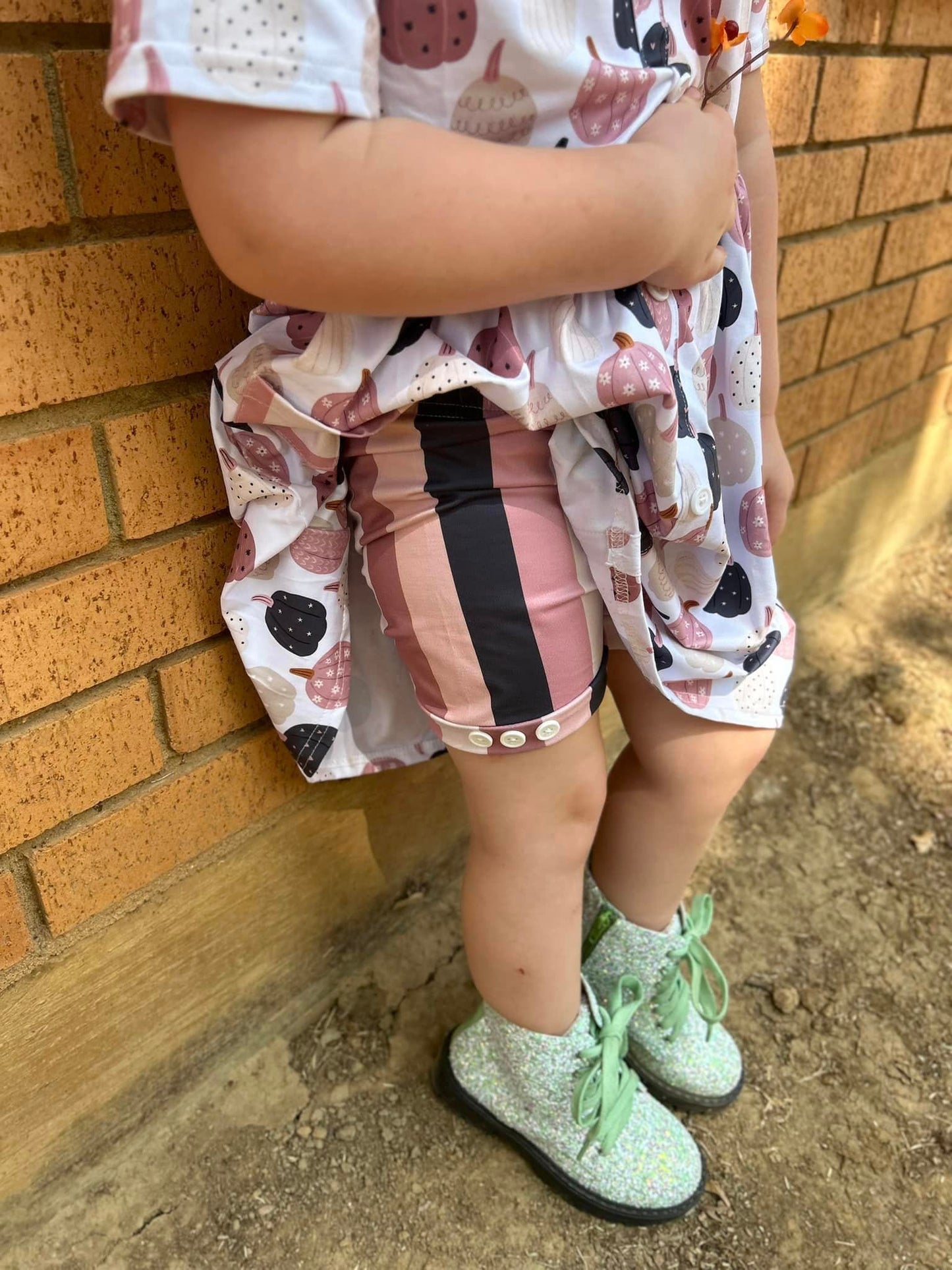 mauve vertical stripe button shorts