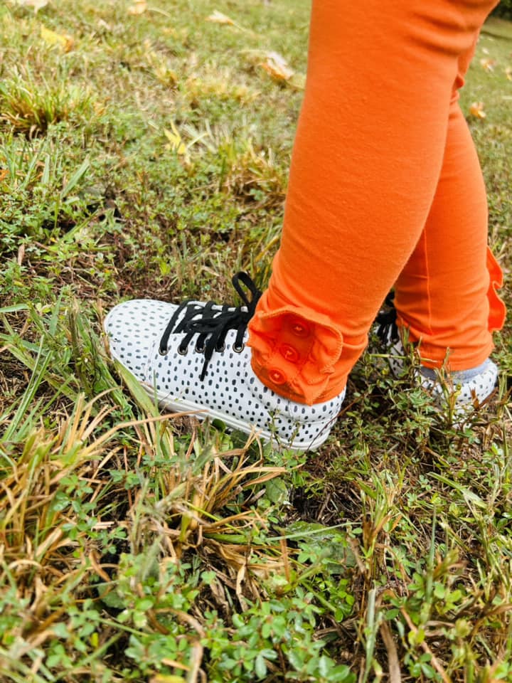 orange ruffle button leggings