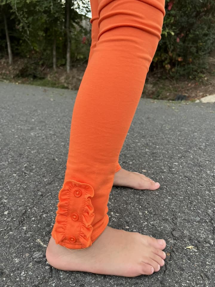 orange ruffle button leggings