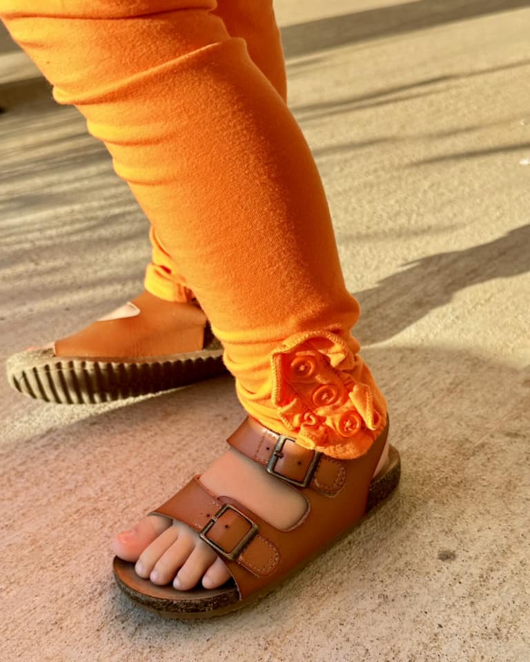 orange ruffle button leggings