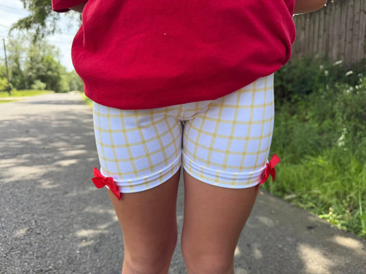 yellow and white checkered shorts with bows