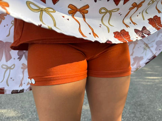 burnt orange button shorts