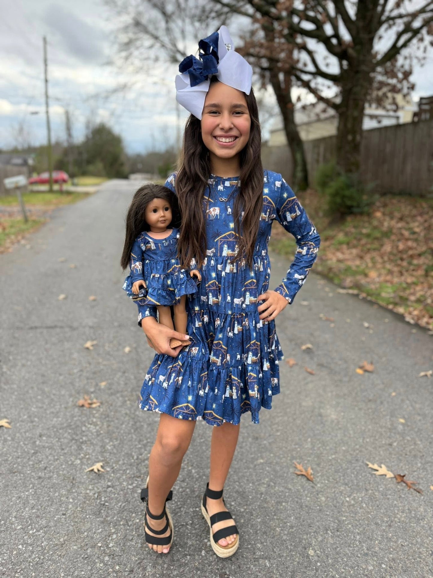 DOLL LS nativity Bella twirl dress and navy blue ruffle button leggings set