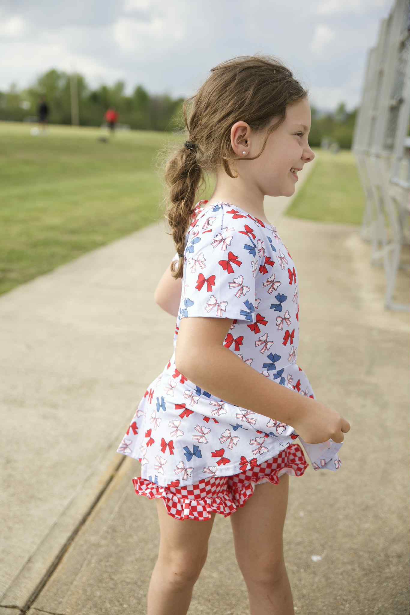 baseball bows twirl top