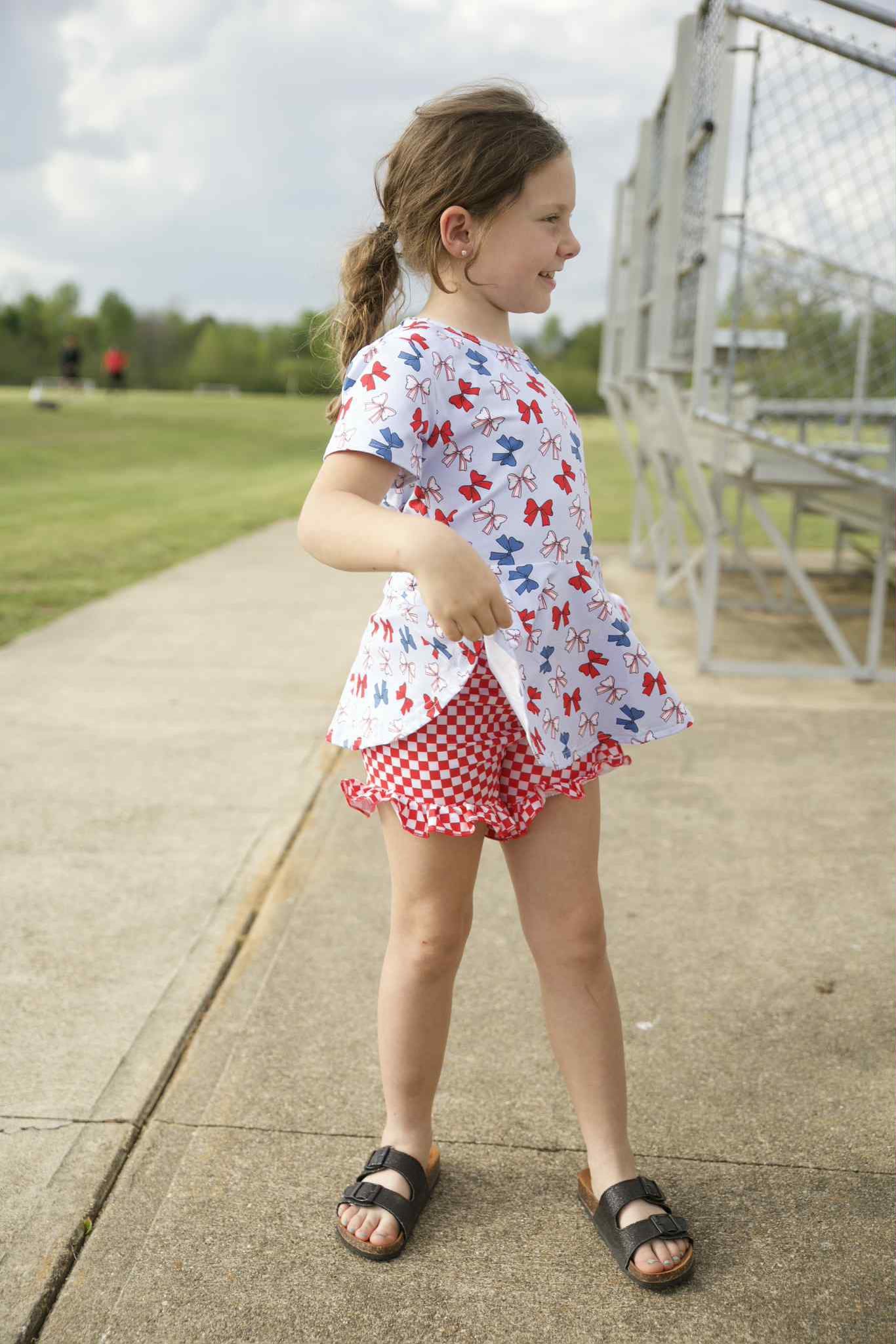 baseball bows twirl top