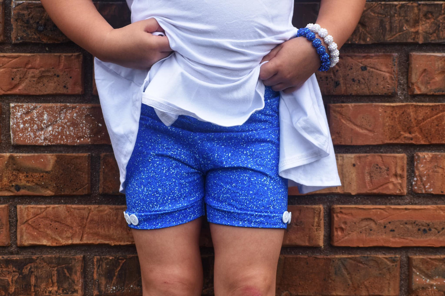 blue glitter button shorties