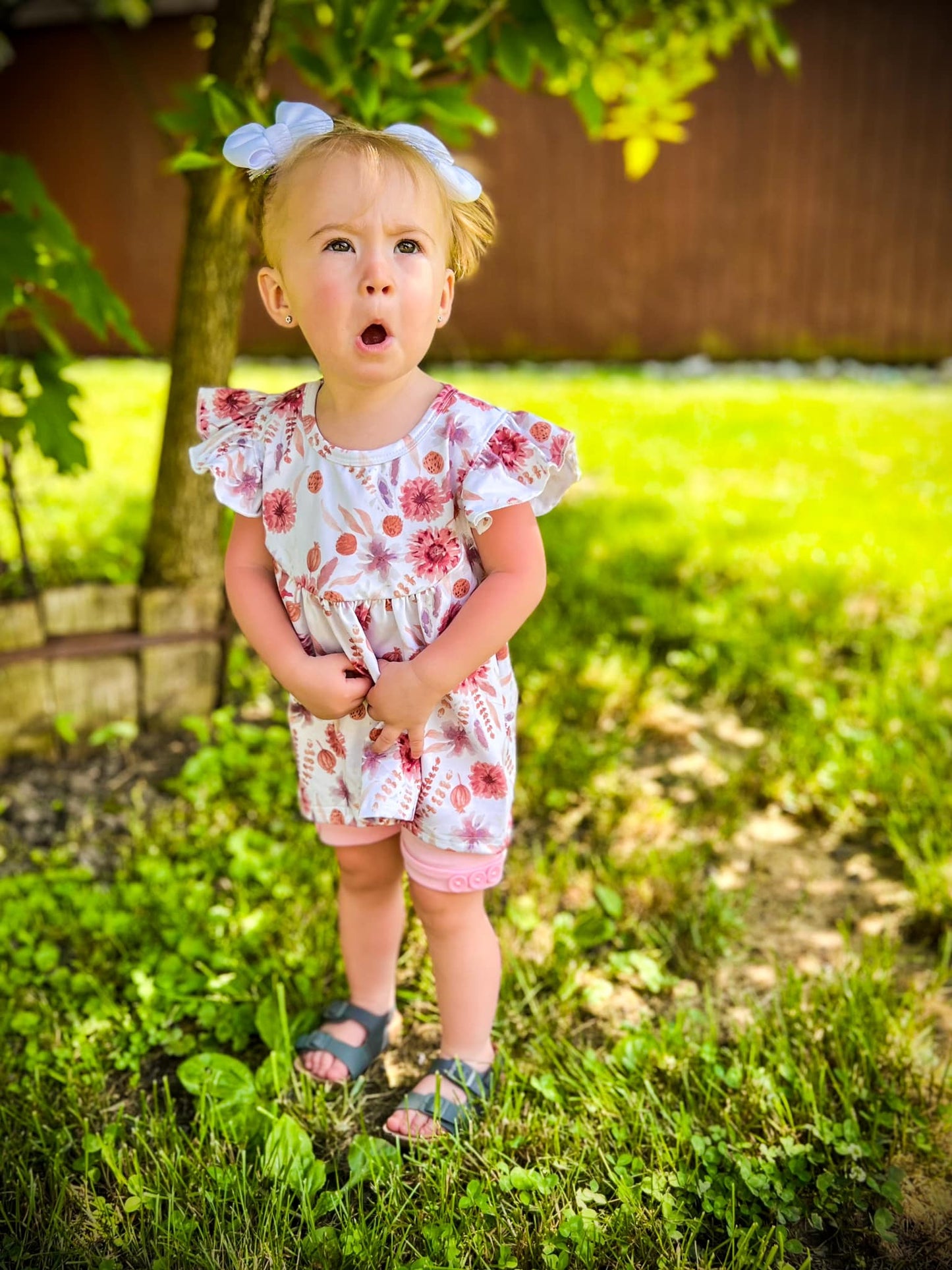 baby pink button shorts