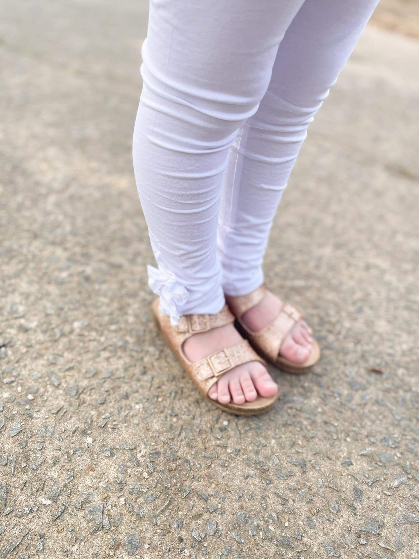 white ruffle button leggings