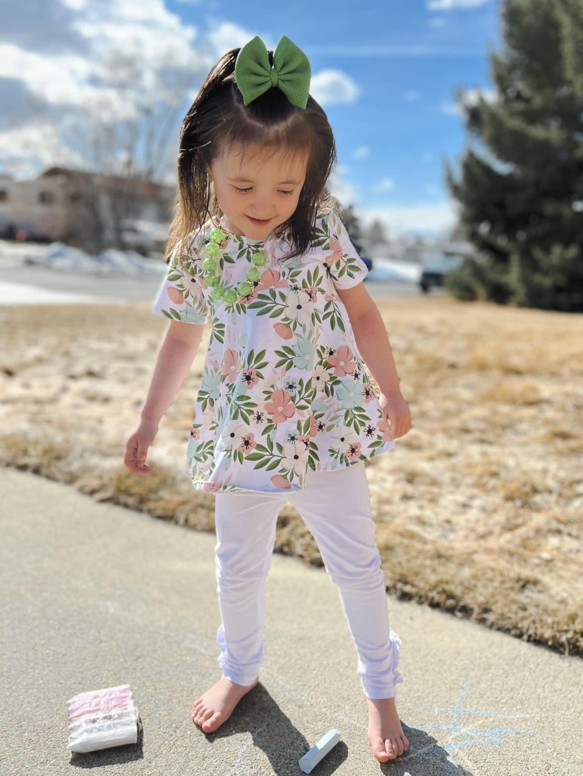 white ruffle button leggings